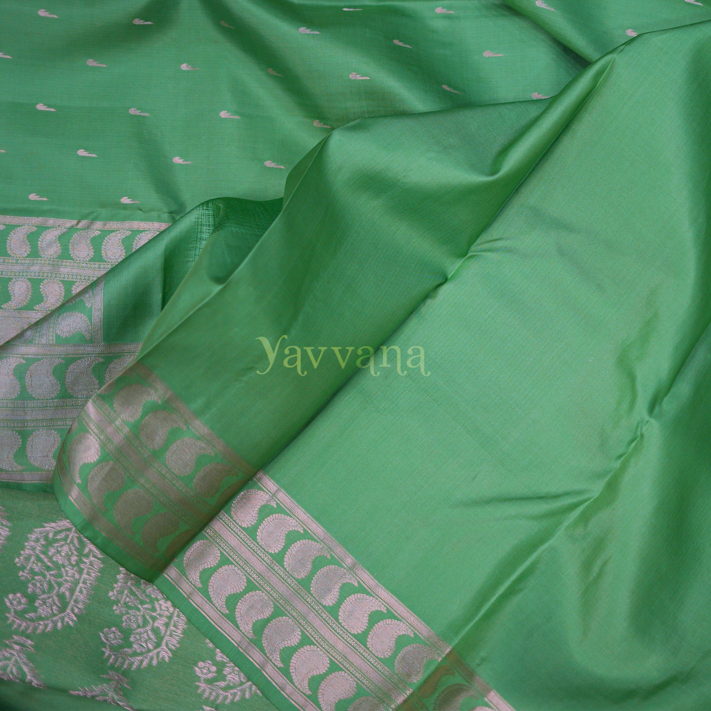 Graceful Green Silk Saree in Silver Zari Accents