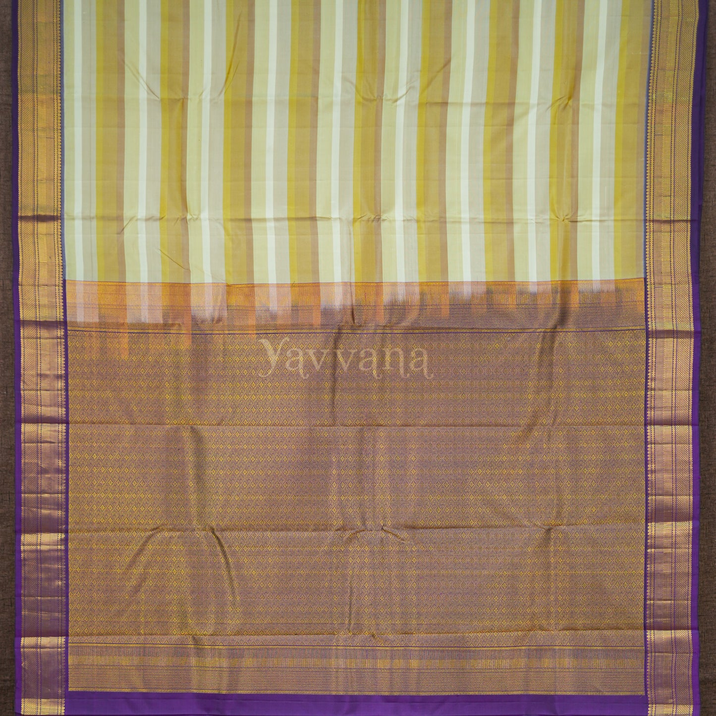 Hues of beige Silk saree with Violet Border