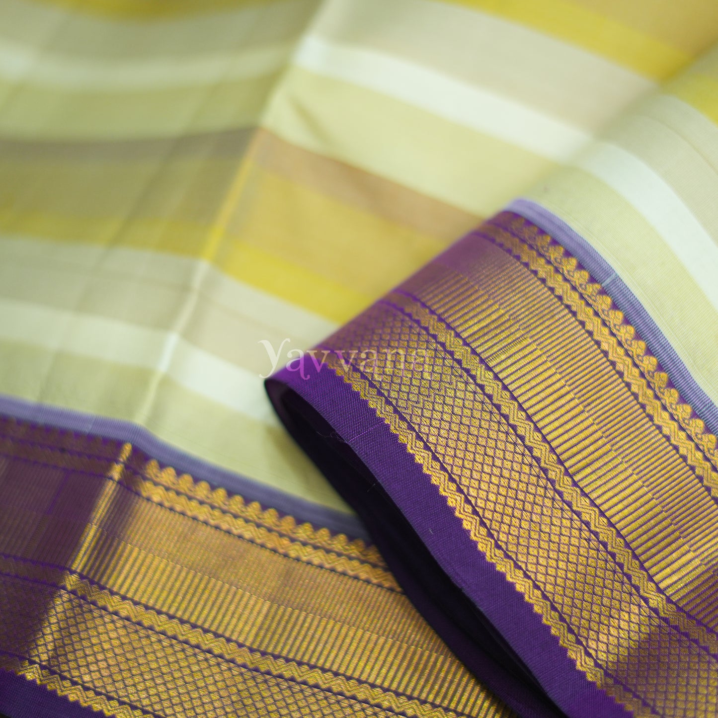 Hues of beige Silk saree with Violet Border