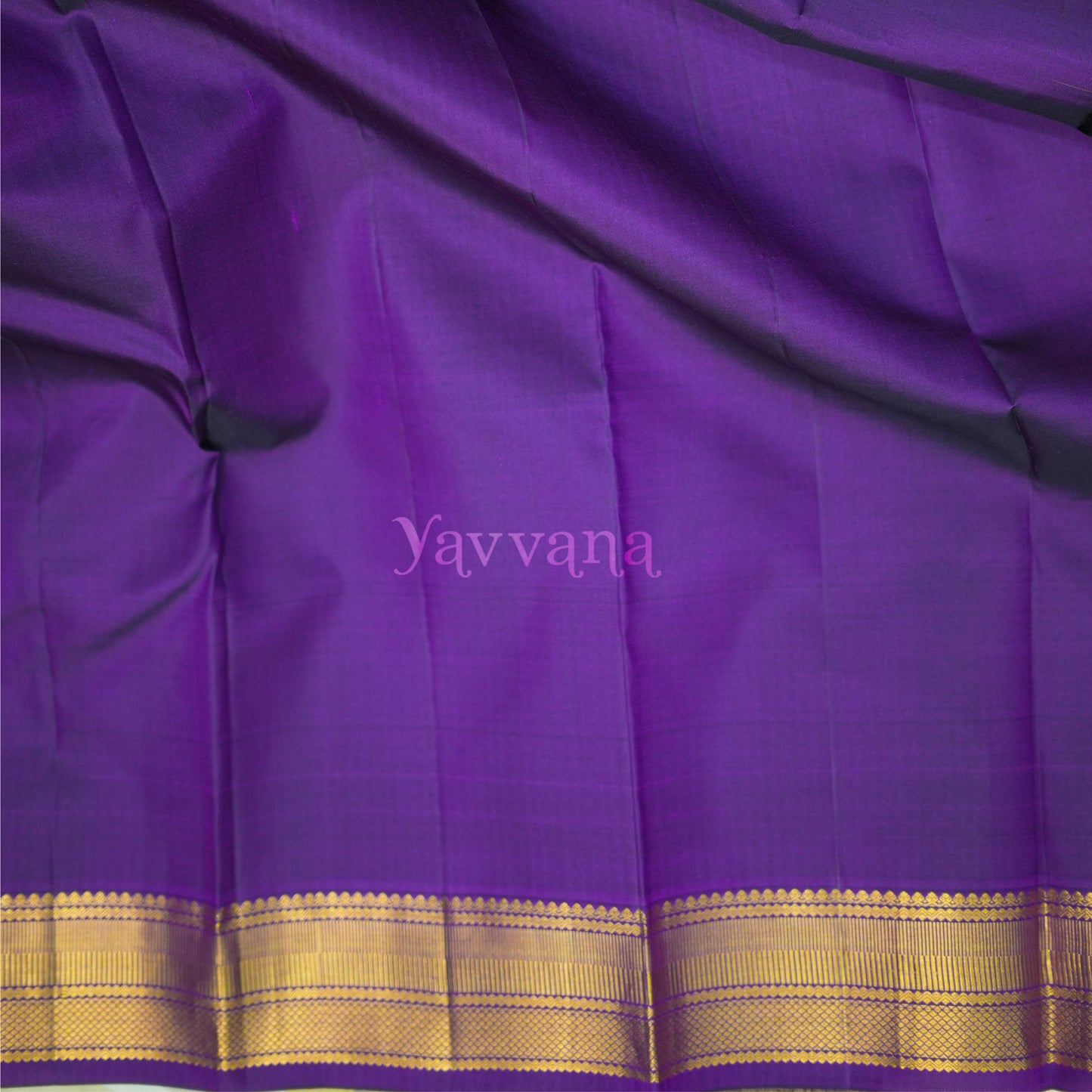 Hues of beige Silk saree with Violet Border
