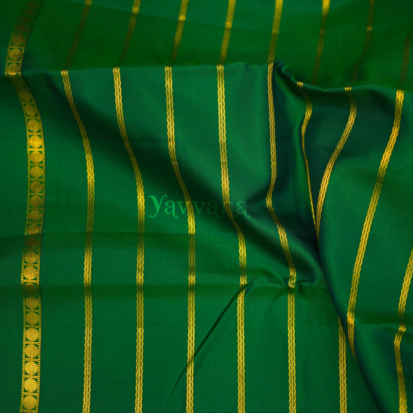 Forest Green Silk Saree with Gold Zari Stripes – A Statement of Grace