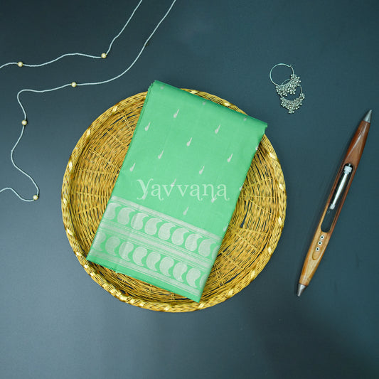 Graceful Green Silk Saree in Silver Zari Accents