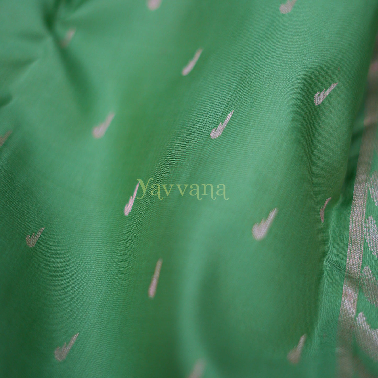 Graceful Green Silk Saree in Silver Zari Accents