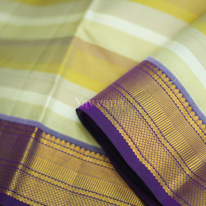 Hues of beige Silk saree with Violet Border