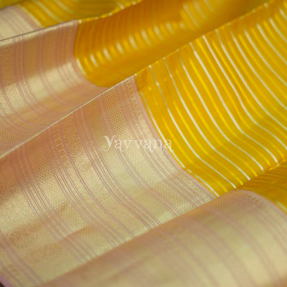 Yellow and Pink Silk Saree with Subtle Zari Accents