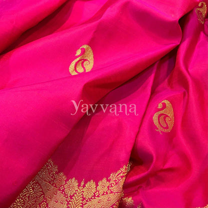 Regal Rani Pink Silk Saree with Grand Peacock Zari design